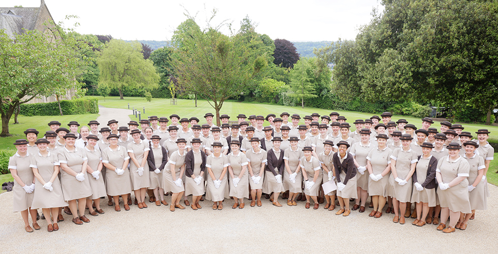 Norland students whole set photo in uniform outside